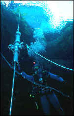 Diver deploying the probe