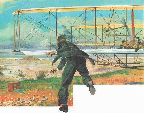 The first flight by a powered airplane at Kitty Hawk. Orville Wright is at the controls while Wilbur, on the ground, tries to hold one wing to prevent the aircraft wobbling