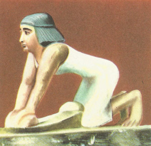 Egyptian woman kneading dough