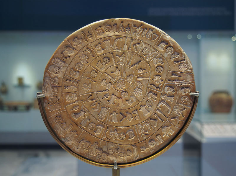The Phaistos Disc (side A), found at Phaistos, south central Crete, in 1908, On display in the Archaeological Museum of Heraklion.