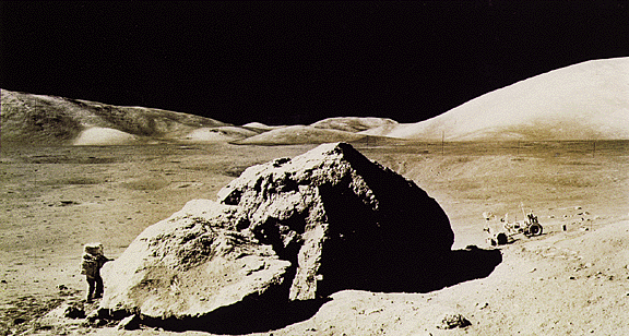 Apollo 17: Schmitt and Lunar Rover next to Split Rock
