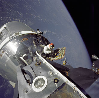 David Scott stands in the open hatch of the Apollo 9 Command Module