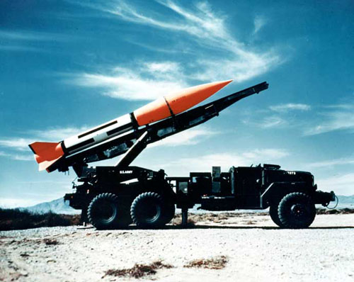 Honest John missile on its mobile launcher-transporter