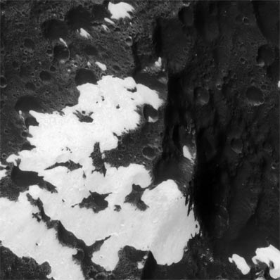 Iapetus bright patches