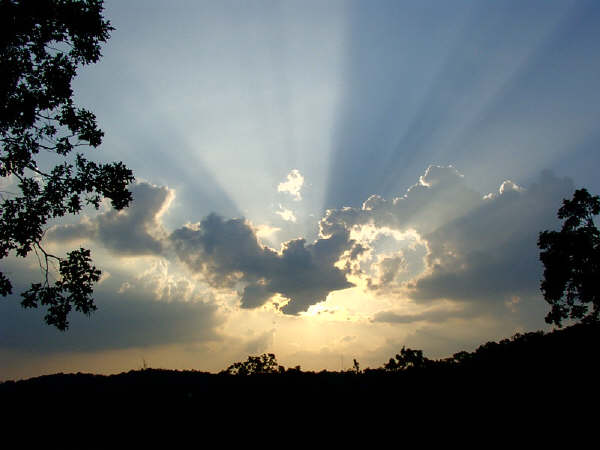 Sun behind clouds