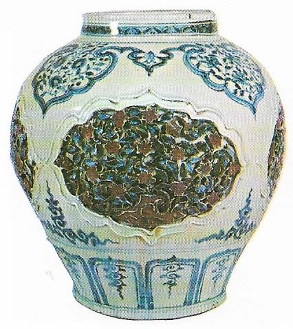 White porcelain was made in a wide range of styles and decorated in Colbert and copper under glaze, as is this large wine jar from the 15th century, which was made at Ching-te-chen, Kiangsi.