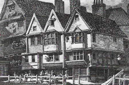 Houses huddled against each other in London. Most dwellings were built of wood, (despite regulations against its use) and they had narrow frontages, steep roofs and projecting upper floors.