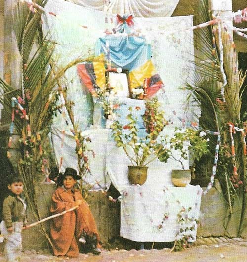 This roadside shrine in Otovalo, Ecuador, symbolises the assimilation of religion at grass roots level. The Church, although concerned with Indian welfare, aided their cultural decline by supporting their employment in the mines. 