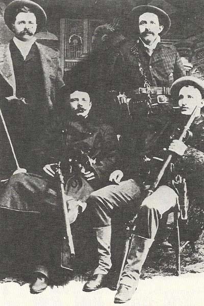 In the unsettled years after the Civil War, bands of outlaws roamed across the central states. One of the best-known figures was Jesse James (1847-1882), here seated front left.