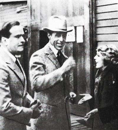 David Wark Griffith (center) was the acknowledged master of silent film in 1919 when he was photographed with two of the highest-paid stars of the day, Mary Pickford and Douglas Fairbanks.