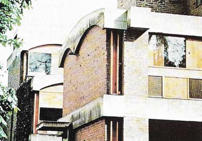 The Jaoul Houses, Paris, designed by Le Corbusier, are two homes on one rectangular site.