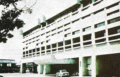 Kurashiki Town Hall, designed by Kenzo Tange, is constructed from the rough cast concrete of International Brutalism and incorporates Corbusian features.