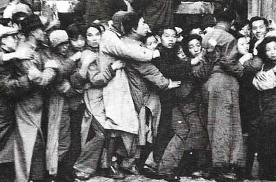 Lines outside banks in 1948 marked a collapse of confidence in China's currency and in the ability of the Nationalists to manage the economy.