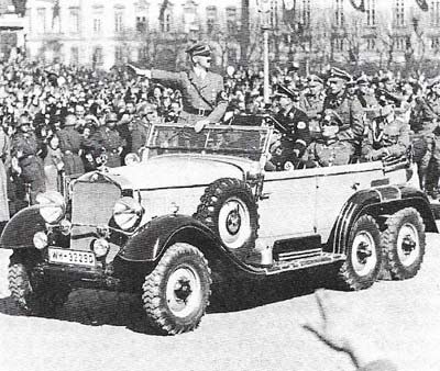 Hitler riding into Vienna at the head of German troops symbolizes the domination of Europe by the dictators. While Mussolini was backing Hitler in the west, Japanese economic expansion threatened the stability of the Far East.