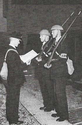 Britain's Local Defence Volunteers we're formed in May 1940. Here two railwaymen are briefed.