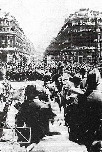 Nazi military bands like this one, photographed in the Place de l'Opera in Paris in June 1941, often played in public in the occupied countries. Ostensibly a goodwill gesture, they were also a symbol of German strength.