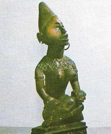Female figures, often holding children, are commonly kept in Bakongo ancestor cult shrines in Angola, to honor the founders of the family.