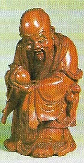 Shou-Lao, symbol rather than god of longevity, holds a golden peach. These ripened only once in 3,000 years in a celestial garden, a Chinese parallel to the paradisaical Tree of Life elsewhere.