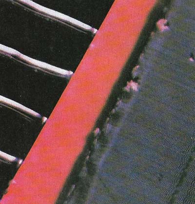 The Teldec (Teiefunken/Decca) videodisk shown much magnified (right), had about 25 hair-line grooves in the space occupied by each groove on a standard LP gramophone record (left). Like the Philips videodisk the disk revolved at 1,500 rpm (UK) or 1,800 rpm (US).