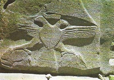 A double-headed eagle is carved on the back of a sphinx at Alaja Huyuk in Turkey, a city of the empire period. It is clutching in its talons two hares with their faces turned outwards like the eagle's heads.