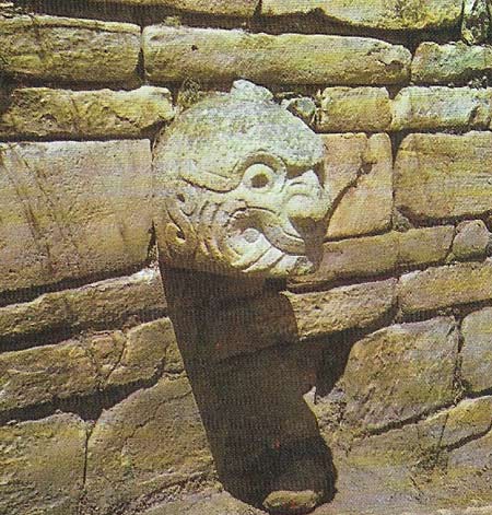 Human and feline characteristics are combined in a sculpture of a monstrous head projecting from the wall of the Castillo, the main structure at Chavin de Huantar.