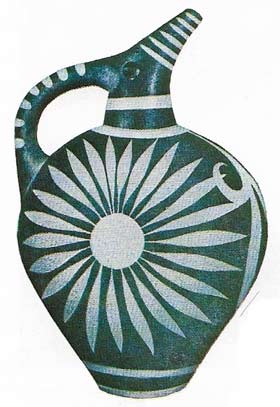The studs on the back of this jug from Phaestos suggest the handle-rivets of a metal prototype, as does the shiny black slip.