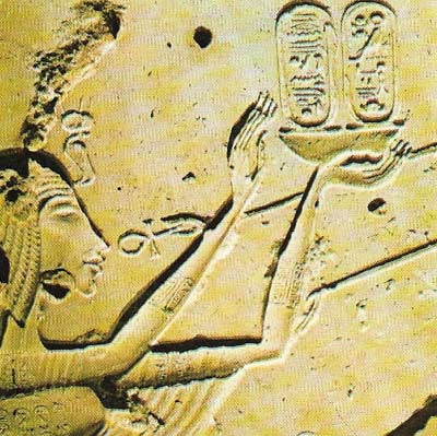 The ancient cult of the sun-god Re had been eclipsed by the rise of the god Amun, until Akhenaton tried to suppress the worship of all gods except Re. The sun-god was represented in the form of the Aton or sun disk, adored here by his queen Nefertiti.