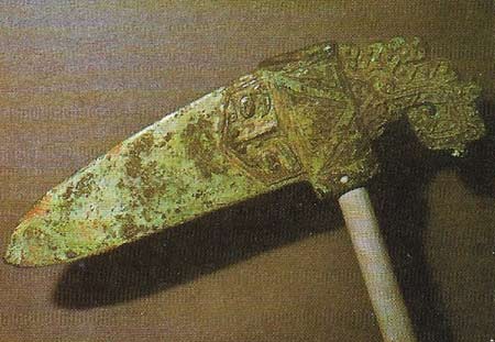 During the Shang Dynasty a highly skilled bronze metallurgy was developed, much later than in the West although it was still the earliest bronzework in East Asia. The two main weapons used by the Shang people were the bow and the halberd. This bronze ritual halberd blade from the Shang Dynasty dates from the late 11th century BC.