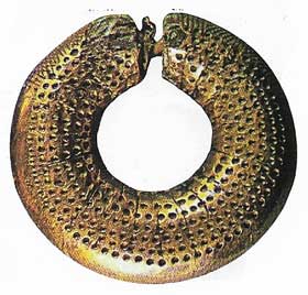Later Celtic symmetry is seen in a gold-plated Irish ring of about 1000 BC.