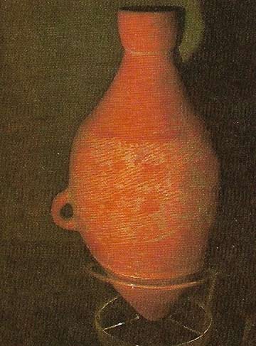 This red pottery amphora was excavated from the Panp'o village site in Shensi province and is an excellent example of the red pottery ware of the Yang-shao culture.