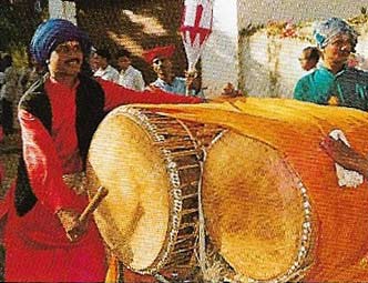 The Indian dhol has two indefinitely pitched heads, each with a loud deep sound.