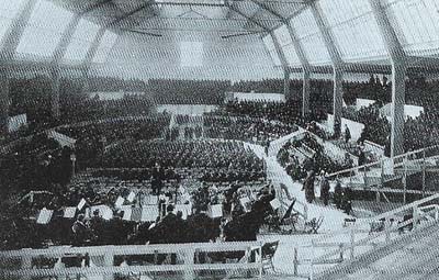 Mahler rehearsing the Eighth Symphony (Symphony of a Thousand). The huge choir extends all the way around the auditorium.