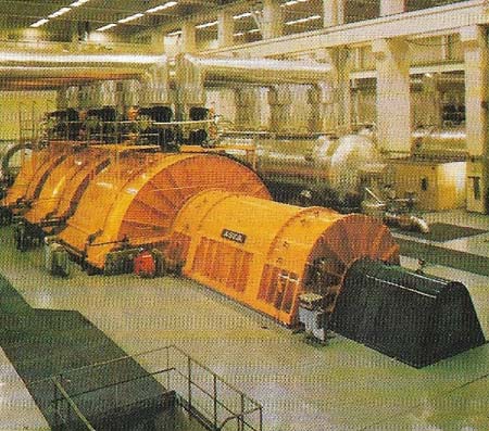 Electrical generators can be AC or DC machines. The output of a DC machine does not depend on an exhaustible chemical process, so it usually gives a steadier direct current than chemical sources. Large generators like these supply alternating current (AC), characterized by a rapid periodic reversal of electron flow. In an AC system the current falls to zero every time the direction of its flow is reversed.