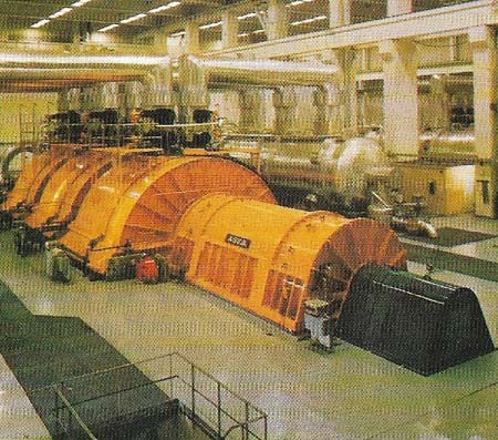 Electrical generators can be AC or DC machines. The output of a DC machine does not depend on an exhaustible chemical process, so it usually gives a steadier direct current than chemical sources. Large generators like these supply alternating current (AC), characterized by a rapid periodic reversal of electron flow. In an AC system the current falls to zero every time the direction of its flow is reversed.
