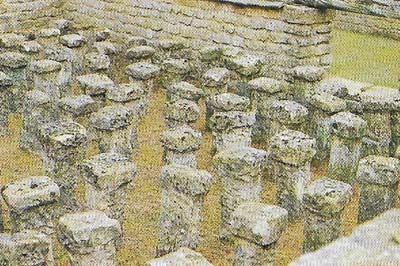 The central heating system (part of which is shown) at Chedworth Roman villa, near Cheltenham, worked by means of a hypocaust.