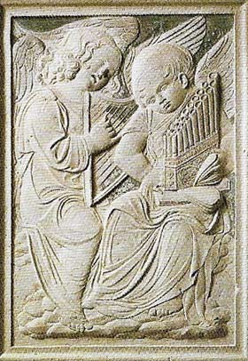 These two putti, one playing a small harp and the other the portative organ, are from the frieze of musical angels to the Chapel of Isotta degli Atti in Rimini.