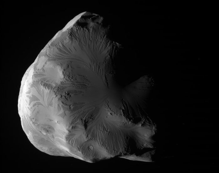 Helene imaged from a distance of 340,000 km by Cassini 
            June 18, 2011. Image credit: NASA/JPL-Caltech/Space Science Institute