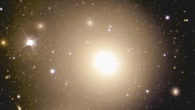 The supergiant elliptical NGC 3311, the centrally dominant cD galaxy in the Hydra I cluster. The normal giant elliptical, NGC 3309 at the bottom of the picture, is also in the cluster.