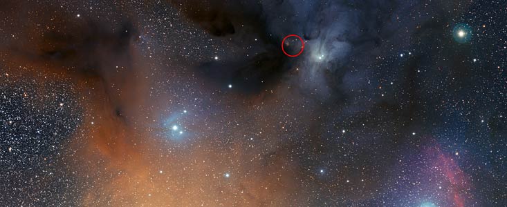 Part of the nebular complex around Rho Ophiuchi. The region where hydrogen peroxide was found is circled. Credit: ESO