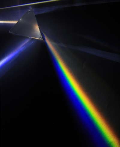 A triangular prism, dispersing light.