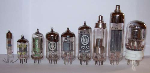 A variety of electron tubes (thermionic vacuum tubes), some with top cap connections for higher voltages.
