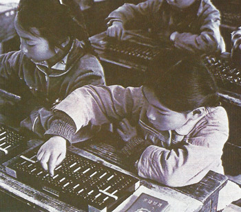 Chinese children using abacus