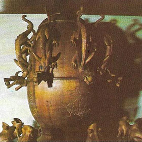 The earliest known Chinese seismograph depicts eight dragons, each holding a ball in its mouth.