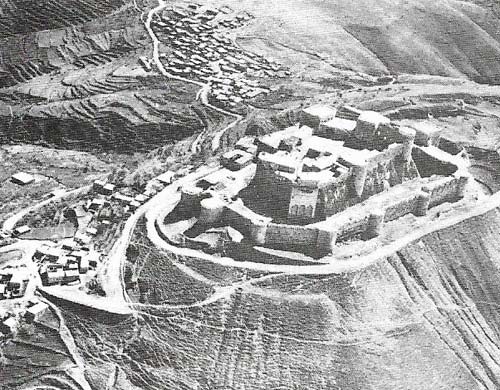 Krak des Chevaliers, best-preserved of Crusader castles, guarded the northwest flank of the County of Tripoli.