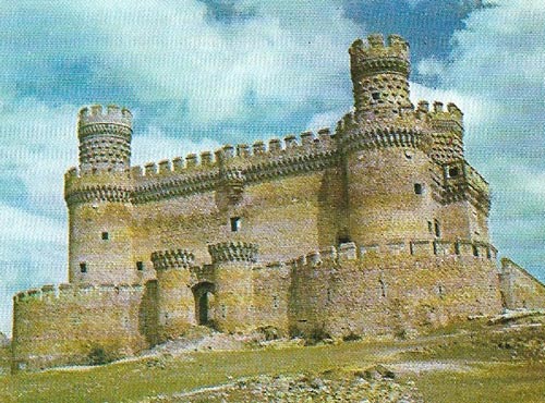 The castle of Manzanares el Real, to the north of Madrid, was constructed near the site of an earlier fortress during the second half of the 15th century in the elaborate Mudejar and late Gothic styles.