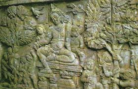 Chandi Mendut, a small temple of the Borobudur group, probably served as an antechapel. This relief, on the north wall of the porch, shows Kuvera, god of wealth, often associated with the merchant class who supported Buddhism.