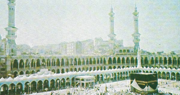 In the center of Mecca stands the Kaaba (cube), a stone building covered with a black cloth, toward which Muslims turn in prayer and round which they go at times of pilgrimage.