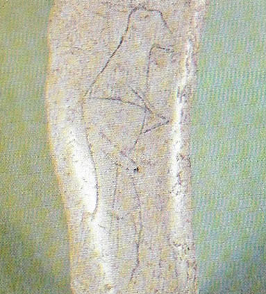 Carving of a male figure, scratched on an animal's rib bone, is probably about 12,000 years old.