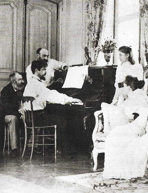 French composer Ernest Chausson turns pages for friend and fellow musician Claude Debussy, at the Chausson family's house in Luzancy (Seine-et_Marne), August 1893.