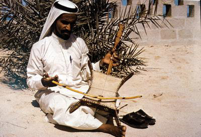 A Bedouin playing the rabab